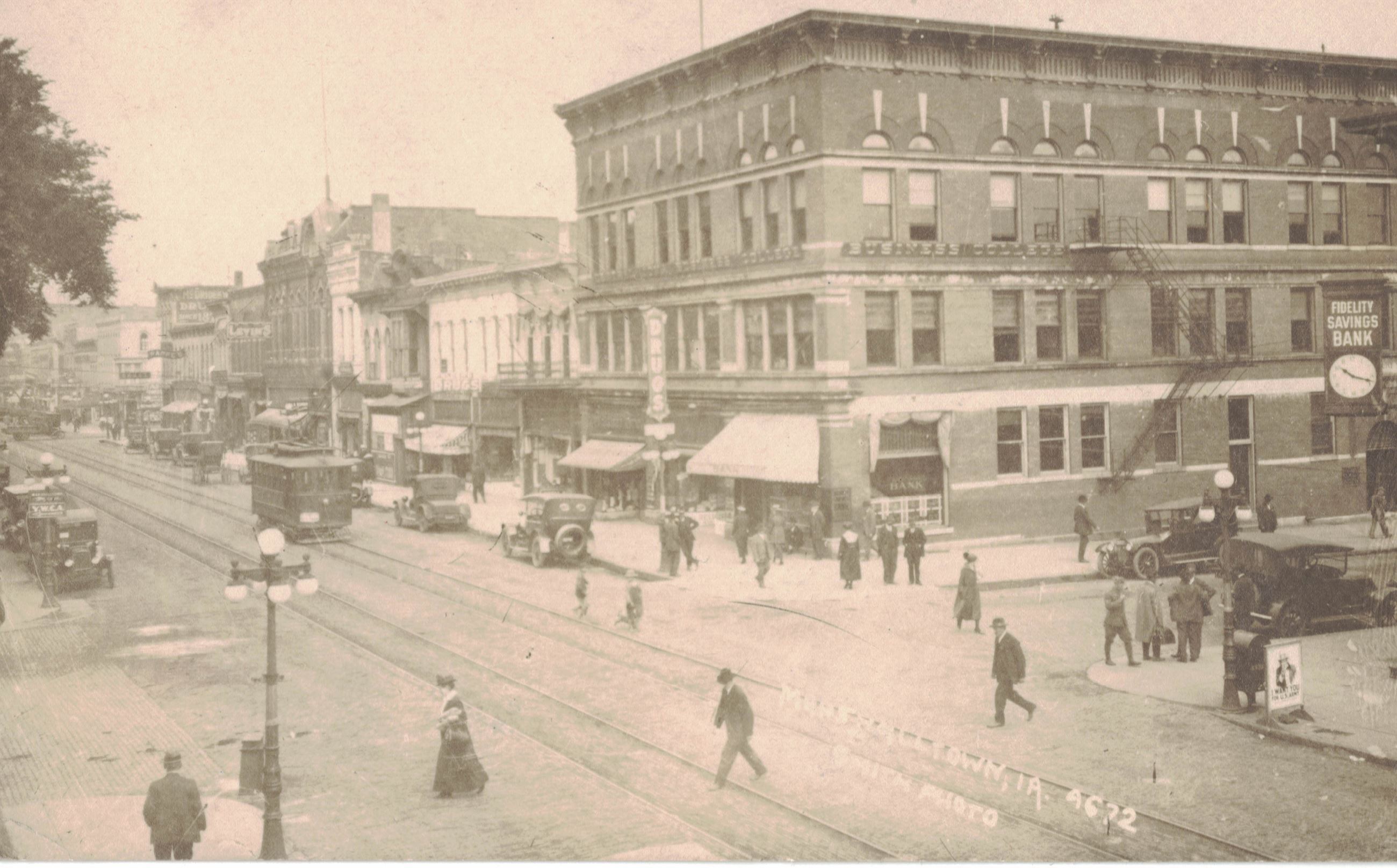 Downtown Marshalltown, 1st Avenue and Main Street, image of postcard front